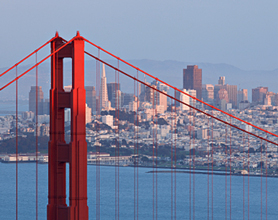 Wide shot of San Francisco with the Golden Gate Bridge in the foreground